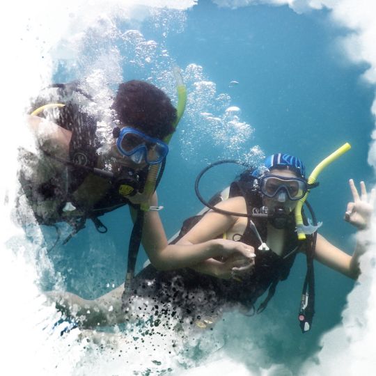 Two scuba divers underwater